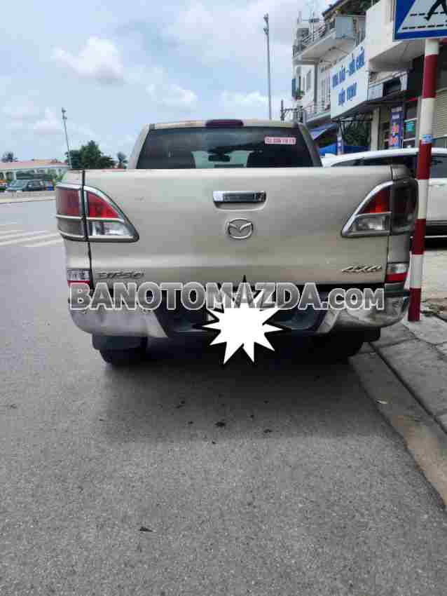 Cần bán Mazda BT50 3.2L 4x4 AT Máy dầu 2013 màu Vàng