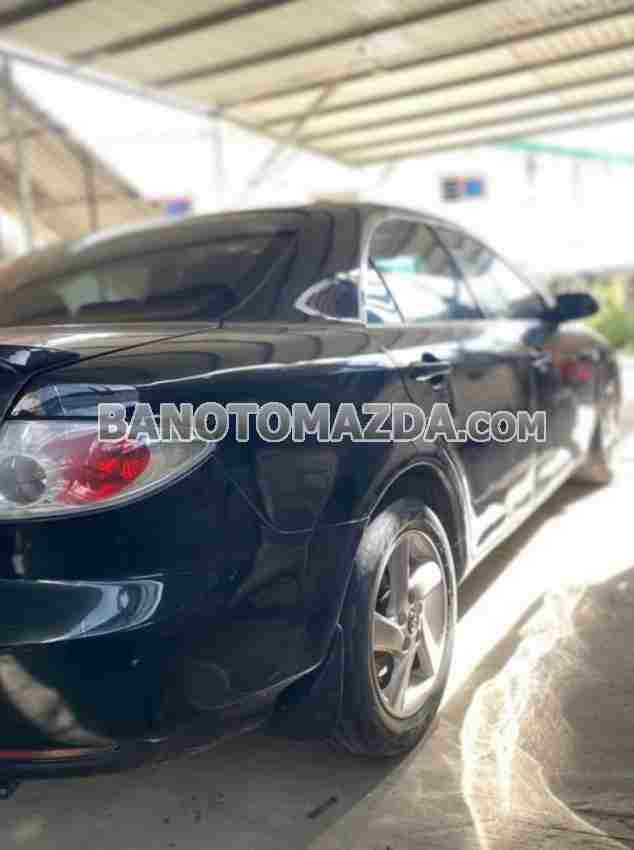 Cần bán gấp xe Mazda 6 2.0 MT năm 2003, màu Đen, Số tay