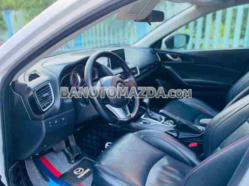Cần bán gấp xe Mazda 3 1.5 AT 2016 màu Trắng